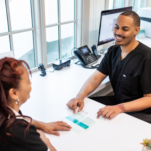 dentist talking to patient